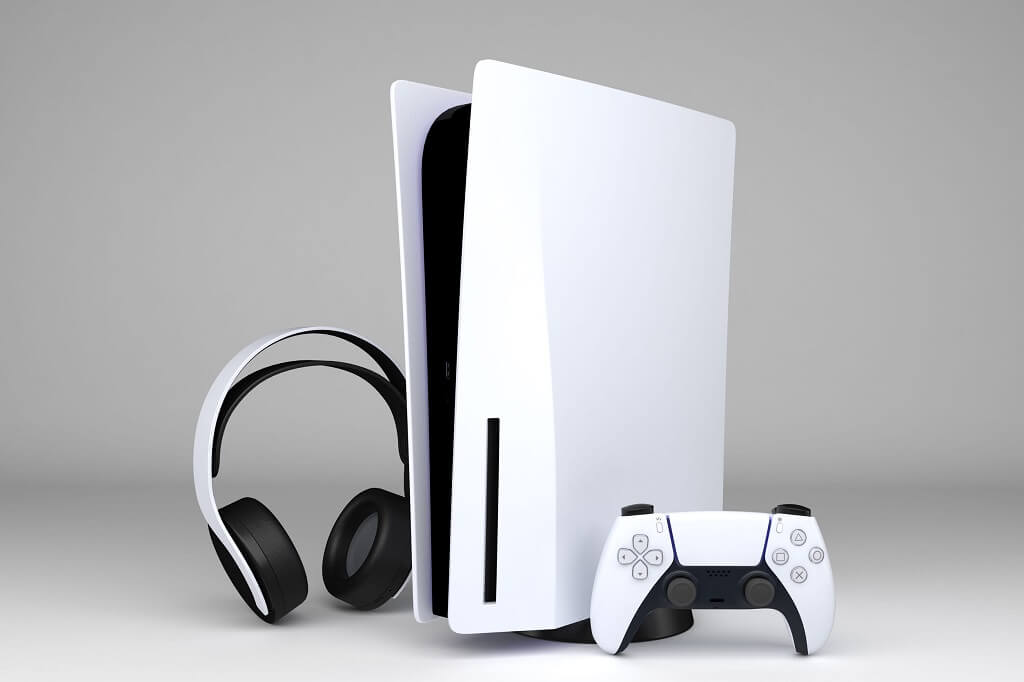 PlayStation 5 konzola sa DualSense kontrolerom i slušalicama